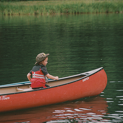 Boy in a canoe